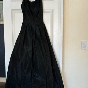 Evening dress lined with net underslip.  Stage, choir, orchestra performances.